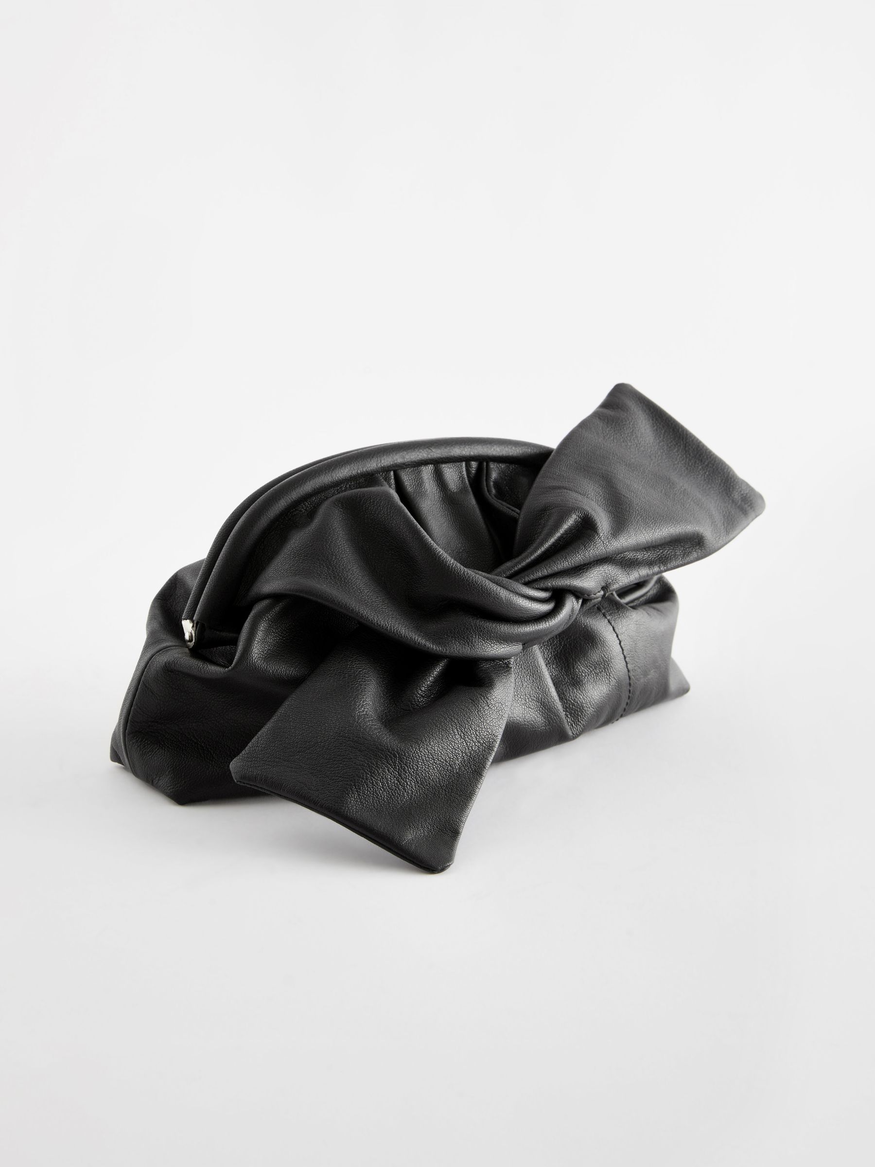 Black bow clutch bag outlet