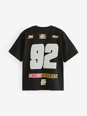 Schwarz, Motocross - Kurzärmeliges Grafik-T-Shirt in Oversized-Passform aus 100 % Baumwolle (3–16 J.) - Bild 2 von 3