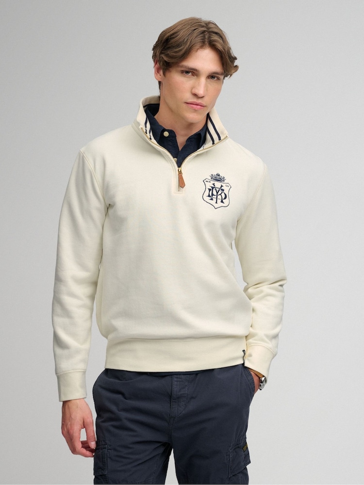 Superdry Cream Gothic Varsity Half Zip Sweatshirt - Image 1 of 7 Superdry Cream Gothic Varsity Half Zip Sweatshirt - Image 1 of 7