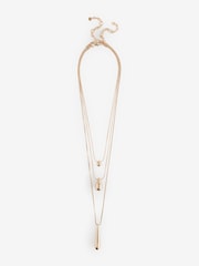 Kalung Liontin Oval Rantai Multibaris Warna Emas Aela - Gambar 1 dari 1