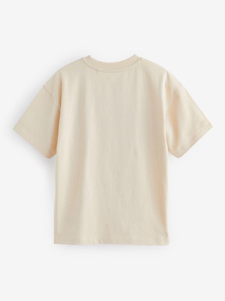 Skater-Stickerei, Creme/Blau - Kurzärmlige T-Shirts mit Grafik 100% Baumwolle 2er-Pack (3–16Jahre) - Bild 2 von 3 Skater-Stickerei, Creme/Blau - Kurzärmlige T-Shirts mit Grafik 100% Baumwolle 2er-Pack (3–16Jahre) - Bild 2 von 3