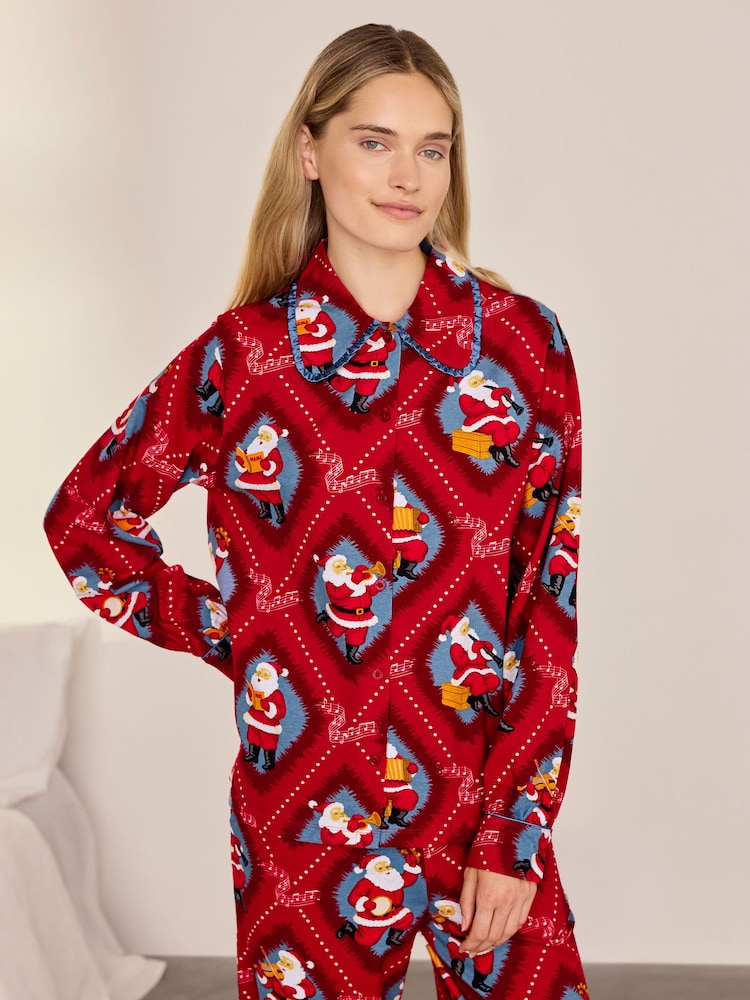 Conjunto de pijama largo de algodón con estampado navideño de Papá Noel con cancionero de Chelsea Peers - Imagen 2 de 7 Conjunto de pijama largo de algodón con estampado navideño de Papá Noel con cancionero de Chelsea Peers - Imagen 2 de 7