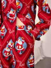Conjunto de pijama largo de algodón con estampado navideño de Papá Noel con cancionero de Chelsea Peers - Imagen 3 de 7