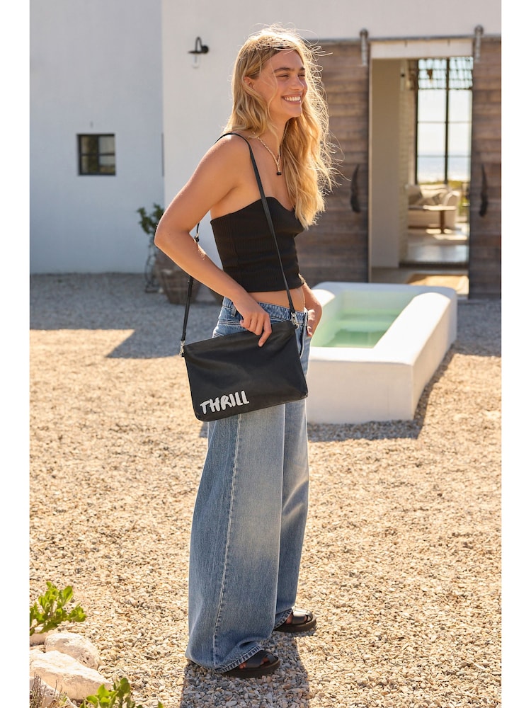 Schwarz mit Schriftzug - Rockett St George Clutch aus Premium-Leder - Bild 1 von 9 Schwarz mit Schriftzug - Rockett St George Clutch aus Premium-Leder - Bild 1 von 9