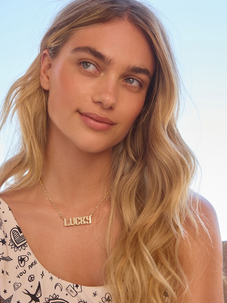 Rockett St George Gold Tone Lucky Slogan Necklace - Image 2 of 4 Rockett St George Gold Tone Lucky Slogan Necklace - Image 2 of 4