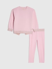 وردي - طقم من سويت شيرت بحزام خصر وبنطلون ضيّق من River Island - صورة 1 من 5