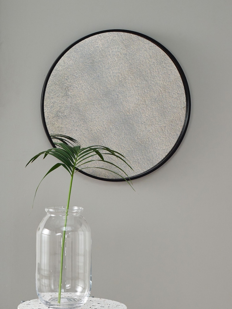 Pacific Black Matt Black Wood Round Mirror With Foxed Glass Wall Mirror - Image 1 of 2