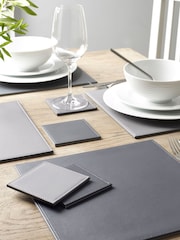 Set of 4 Charcoal/Grey Reversible Faux Leather Placemats and Coasters Set - Image 1 of 3