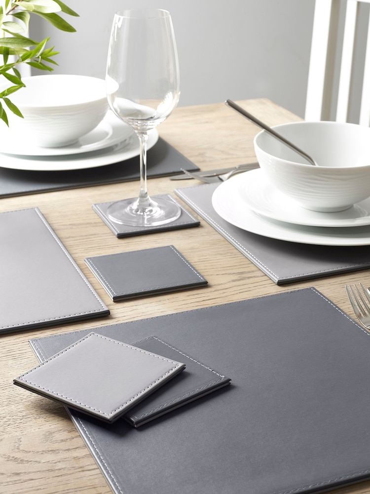 Set of 4 Charcoal/Grey Reversible Faux Leather Placemats and Coasters Set - Image 1 of 3