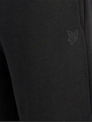 أسود - بنطلون رياضي بالغ النعومة بقصة ضيقة من Lyle & Scott - صورة 6 من 6