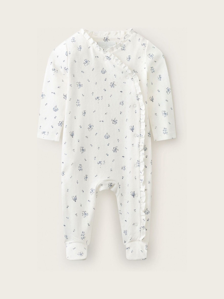 The White Company Blue Pointelle Minnie Floral Frill Wrap Sleepsuit - Image 1 of 4