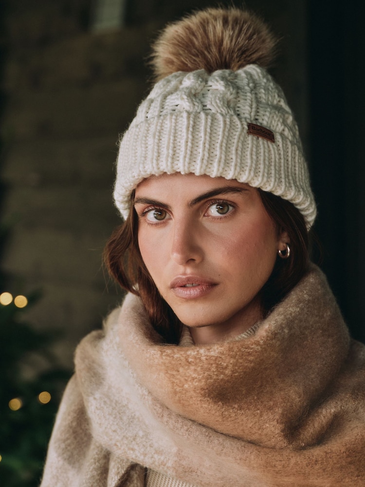 Barbour® Cream Penshaw Cable Knit Faux Fur Pom Beanie Logo Hat - Image 2 of 7