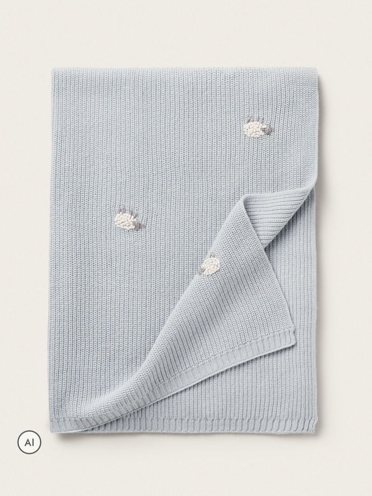 بطانية بمزيج أقمشة برسمة خراف من The White Company - Image 1 of 5