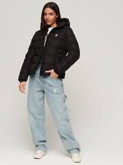 Superdry Black Hooded Spirit Sports Puffer Jacket - Image 1 of 7
