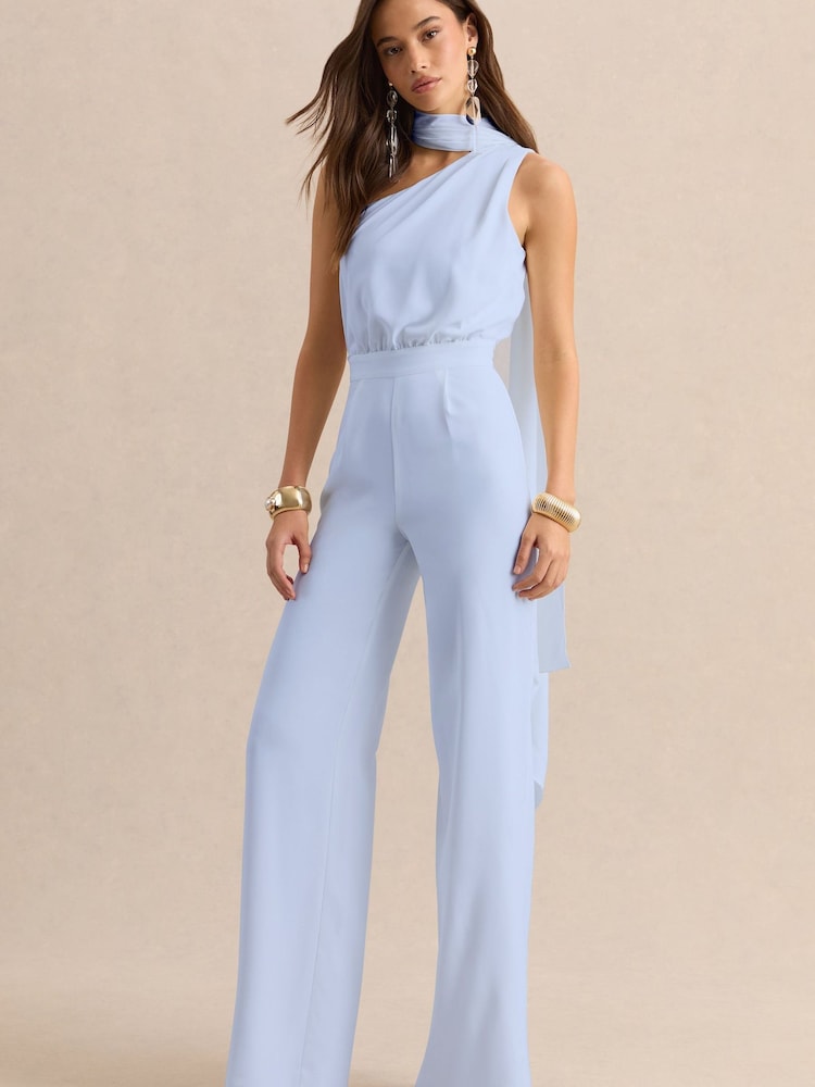 Club L London Blue Gliselle | Asymmetric-Neck Jumpsuit With Scarf-Detail - Image 1 of 6 Club L London Blue Gliselle | Asymmetric-Neck Jumpsuit With Scarf-Detail - Image 1 of 6