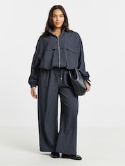 Pantalon ample à fines rayures Simply Be - Image 1 de 4