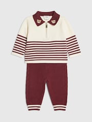 طقم كنزة بولو مخطّطة وبنطلون رياضي من River Island - صورة 1 من 5