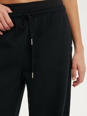 Negro - Pantalones de chándal de pierna ancha con lazo en la cintura y felpa de Cotton On - Imagen 3 de 6