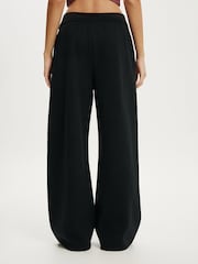 Negro - Pantalones de chándal de pierna ancha con lazo en la cintura y felpa de Cotton On - Imagen 5 de 6