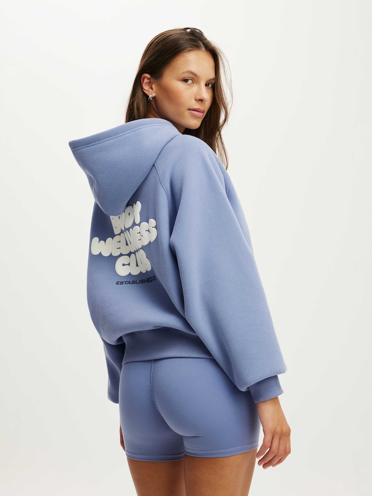 Blå - Cotton On Plysch Premium Grafisk Raglanhuvtröja - Bild 2 av 5