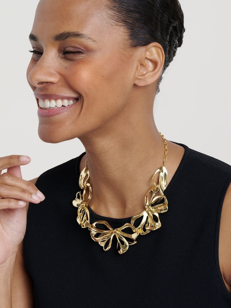 Ted Baker Gold Tone Leona: Abstract Leaf Statement Necklace - Image 1 of 8 Ted Baker Gold Tone Leona: Abstract Leaf Statement Necklace - Image 1 of 8
