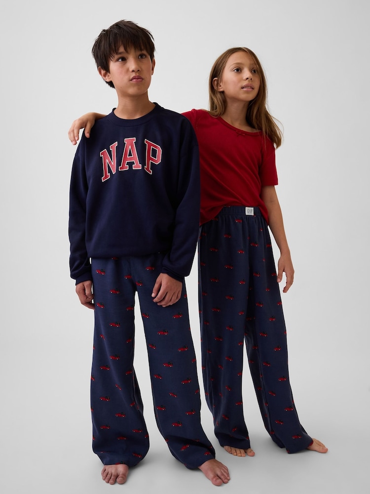 Gap Navy Christmas Truck Matching Family Flannel Pyjama Bottoms (4-13yrs) - Image 1 of 6 Gap Navy Christmas Truck Matching Family Flannel Pyjama Bottoms (4-13yrs) - Image 1 of 6