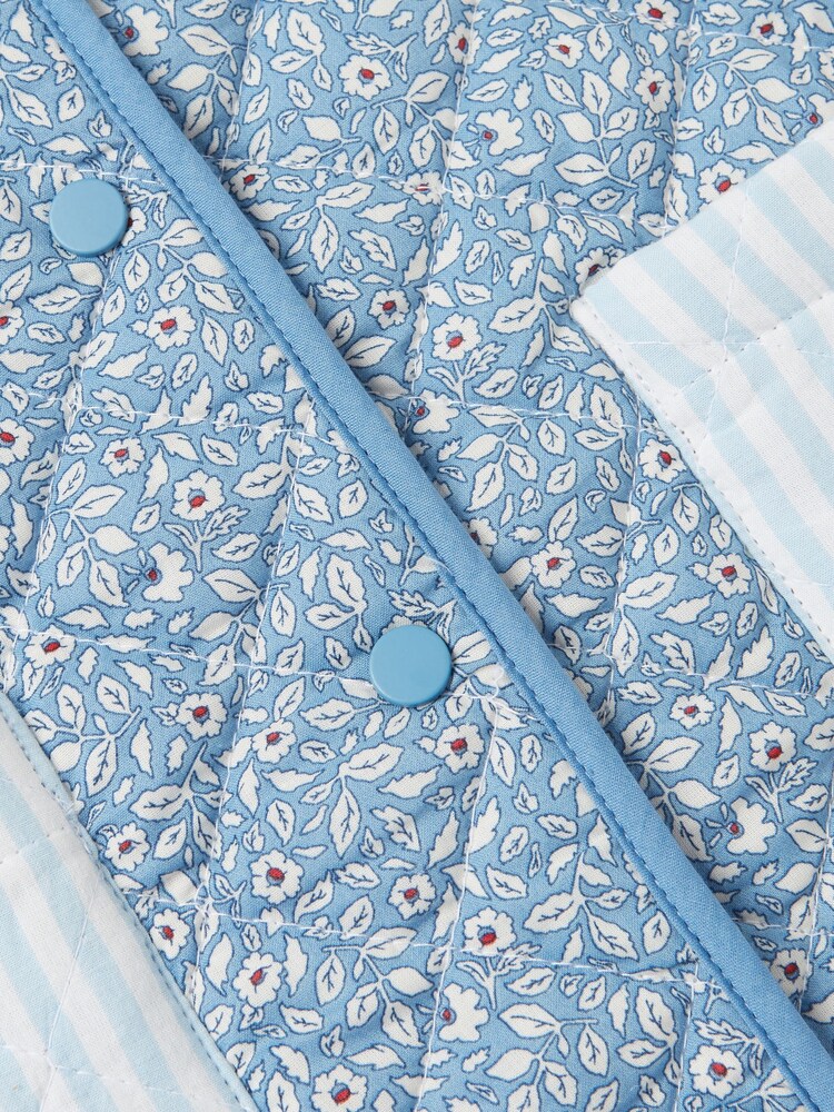 Joules Girls' Raye Blue Floral Reversible Print Quilted Gilet - Image 5 of 5