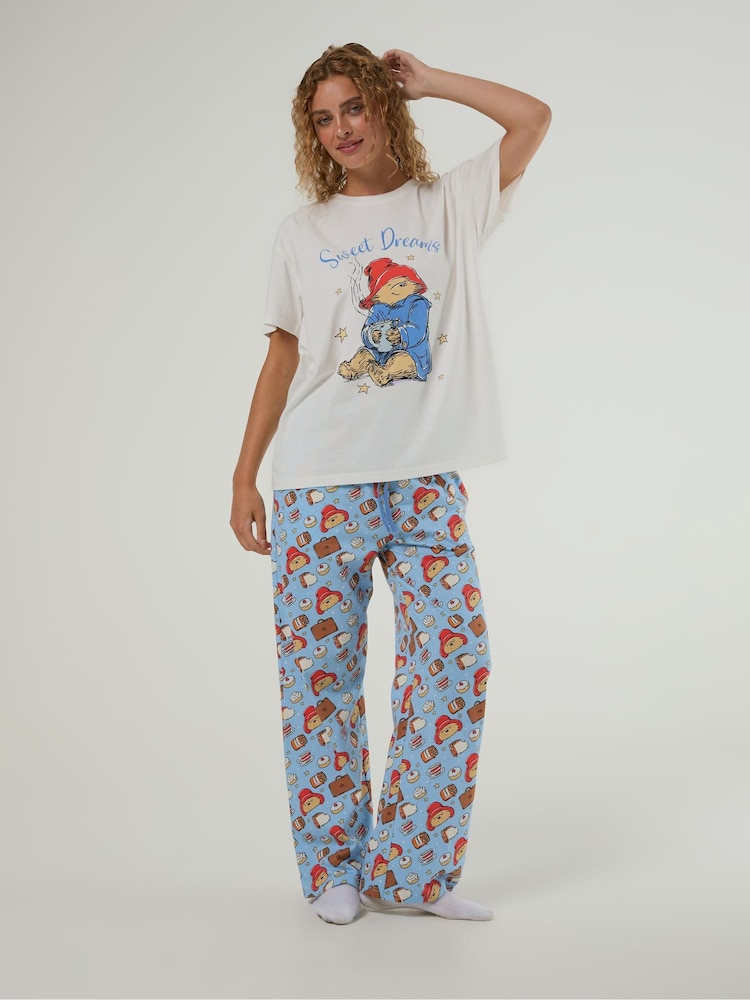 Skinnydip Blue x Paddington T-Shirt and Trouser Pyjamas Set with Eye Mask - Image 1 of 5 Skinnydip Blue x Paddington T-Shirt and Trouser Pyjamas Set with Eye Mask - Image 1 of 5