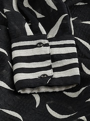 Black and White Moon Print Twist Front Long Sleeve Sheer Textured Blouse - Image 6 of 6