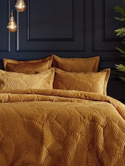 Paoletti Gold Palmeria Quilted Duvet Cover and Oxford Border Pillowcase Set - Image 1 of 3