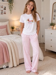 Personalised Kid's Skiing Dachshund Christmas Pyjamas by Koko Blossom - Image 1 of 4