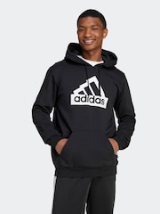 أسود داكن - هودي برسمة من مجموعة Modern Essentials من adidas - صورة 1 من 1