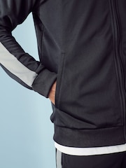 črna - adidas Tricot z izrazitim barvnim vzorcem trenirka - Slika 5 iz 6