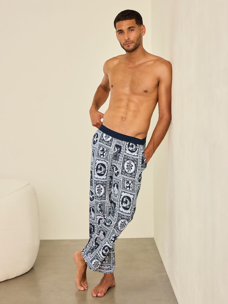 Pantalones largos de pijama de algodón con estampado de Tile "Érase una vez" de Chelsea Peers - Imagen 1 de 6 Pantalones largos de pijama de algodón con estampado de Tile "Érase una vez" de Chelsea Peers - Imagen 1 de 6