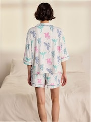 Conjunto de pijama corto con estampado de dragón arcoíris de Chelsea Peers - Imagen 4 de 7