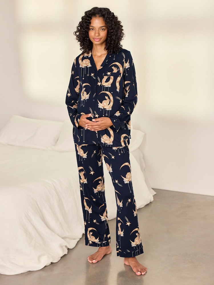 Conjunto de pijama largo con estampado de conejitos lunares y diseño abotonado de Chelsea Peers - Imagen 1 de 8