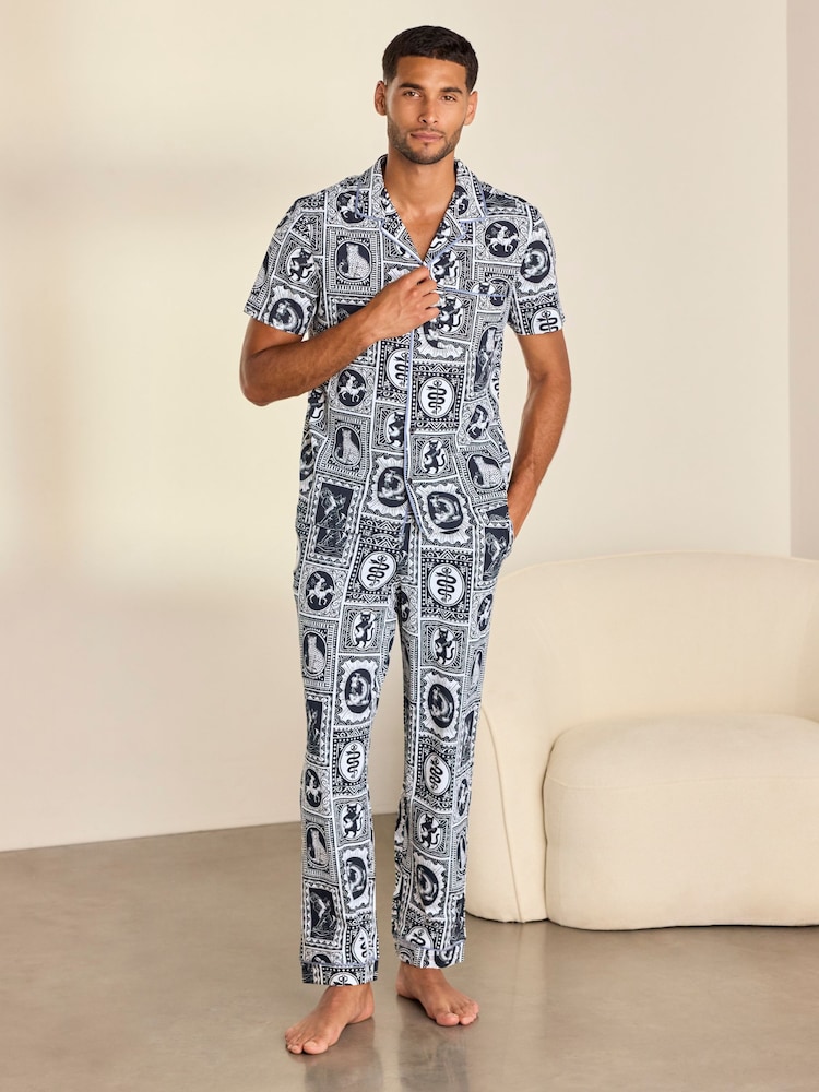 Conjunto de pijama largo de algodón con estampado de Tile "Érase una vez" de Chelsea Peers - Imagen 1 de 8 Conjunto de pijama largo de algodón con estampado de Tile "Érase una vez" de Chelsea Peers - Imagen 1 de 8