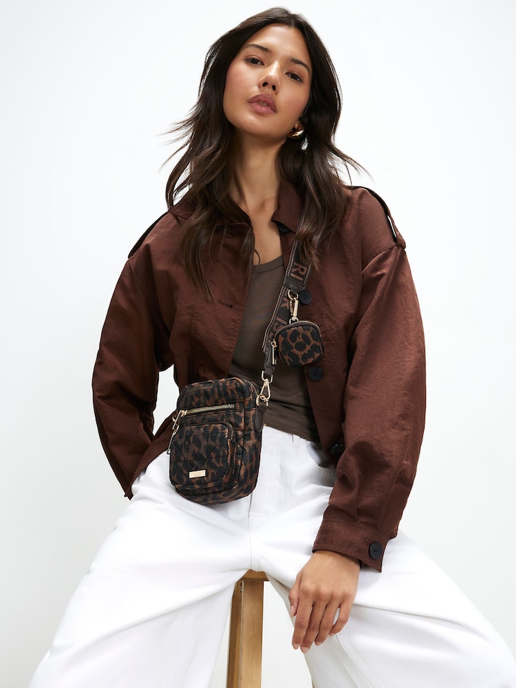 River Island Brown Leopard Webbing Strap Cross-Body Bag - Image 1 of 6 River Island Brown Leopard Webbing Strap Cross-Body Bag - Image 1 of 6