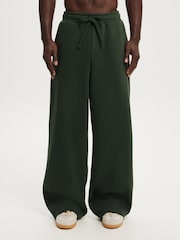 أخضر داكن - بنطلون واسع جدًا Super Baggy من Cotton On - صورة 1 من 5