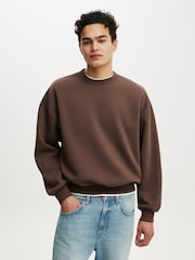 Braun - Cotton On Pullover-Sweatshirt in Relaxed Fit mit Rundhalsausschnitt - Bild 1 von 4