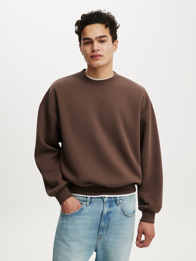 Braun - Cotton On Pullover-Sweatshirt in Relaxed Fit mit Rundhalsausschnitt - Bild 1 von 4 Braun - Cotton On Pullover-Sweatshirt in Relaxed Fit mit Rundhalsausschnitt - Bild 1 von 4