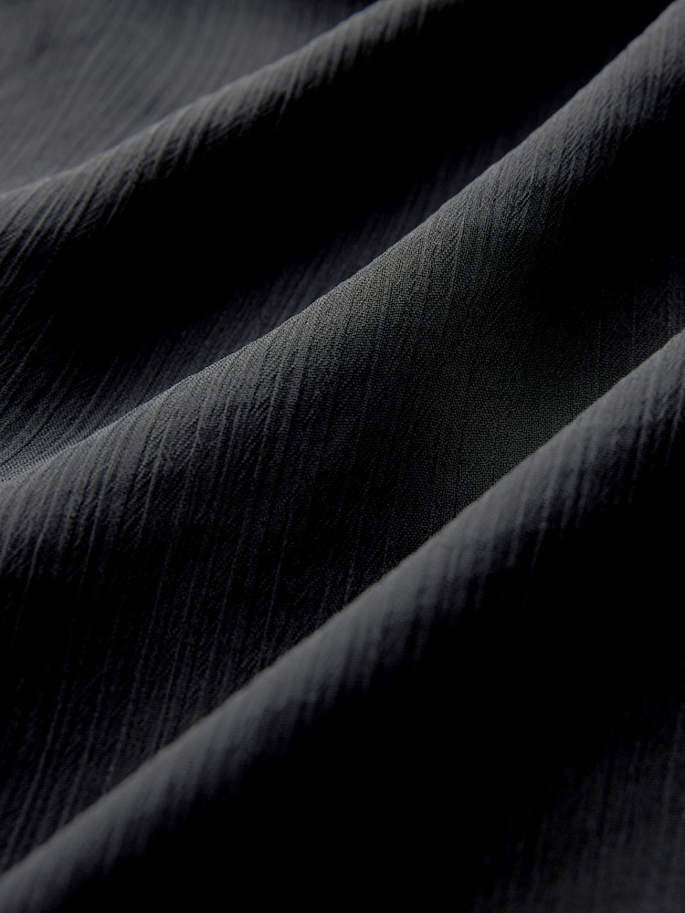 Schwarz - Langärmeliges Top mit Korsagenausschnitt und Neckholder - Bild 7 von 7 Schwarz - Langärmeliges Top mit Korsagenausschnitt und Neckholder - Bild 7 von 7