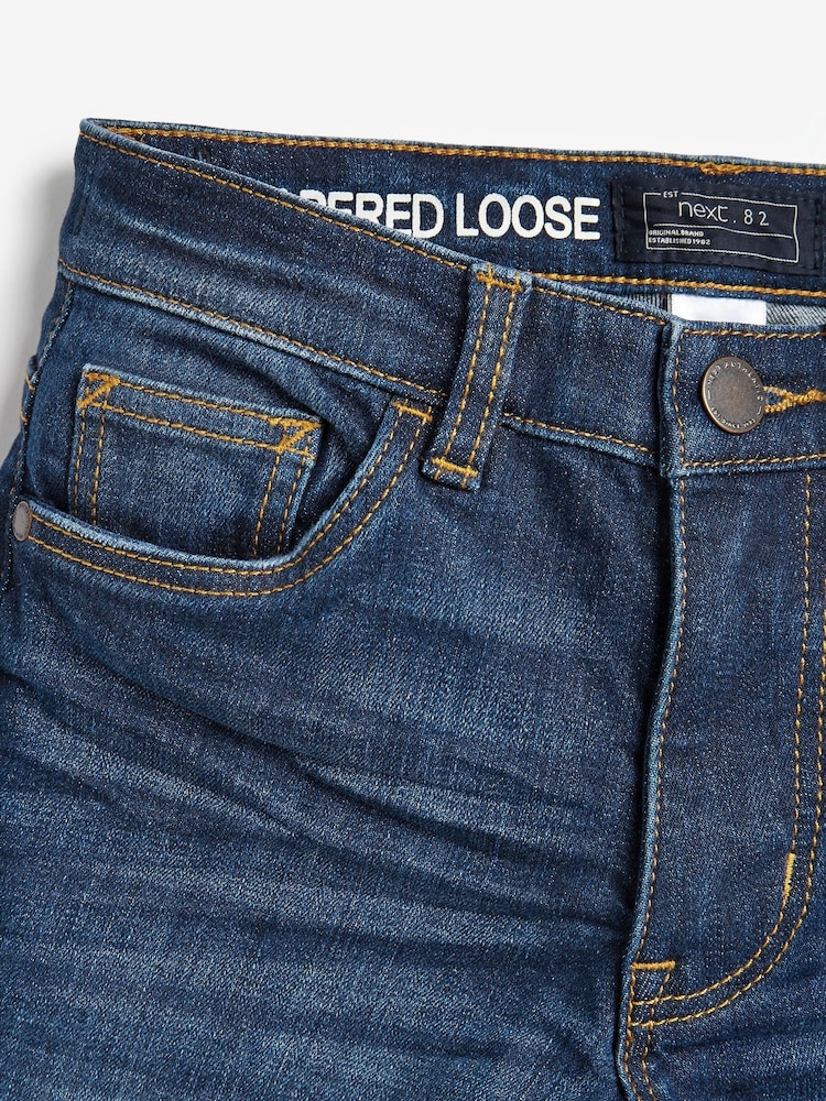 Blue Tapered Loose Fit Cotton Rich Stretch Jeans (3-17yrs) - Image 3 of 3