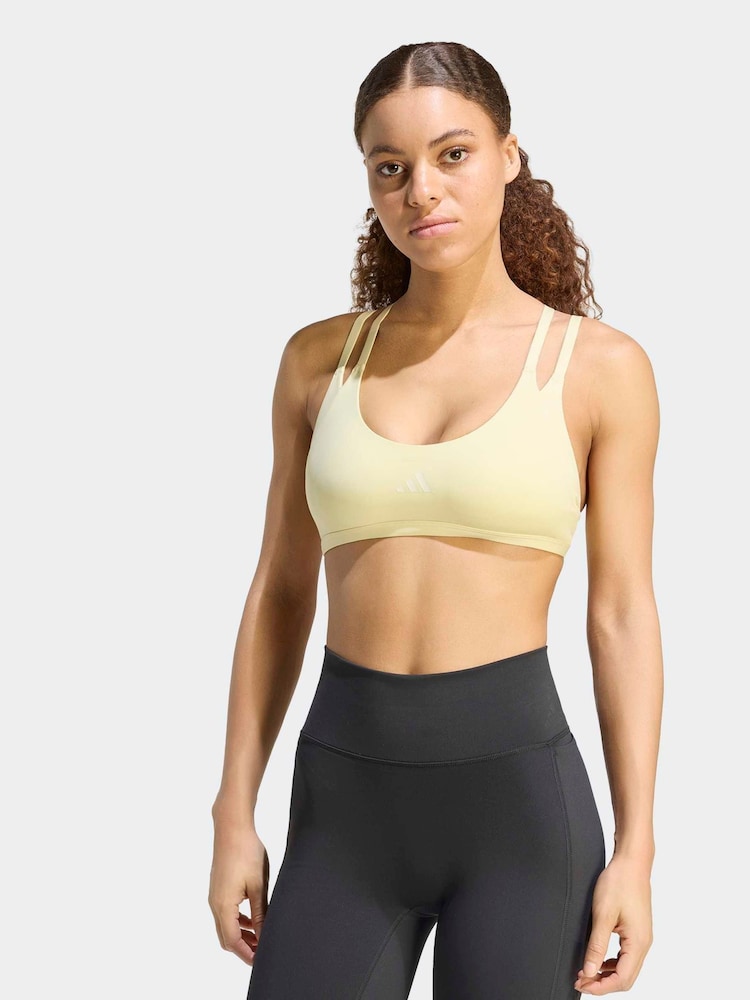 adidas Yellow Optime Workout Strappy Light Support Bra - Image 1 of 6 adidas Yellow Optime Workout Strappy Light Support Bra - Image 1 of 6