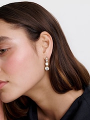Karen Millen Gold Tone Crystal Flow Drop Earrings - Image 1 of 6