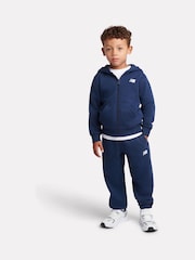 Azul - Conjunto de pantalón deportivo y pantalones de chándal con cremallera y logo pequeño de New Balance. - Imagen 1 de 8