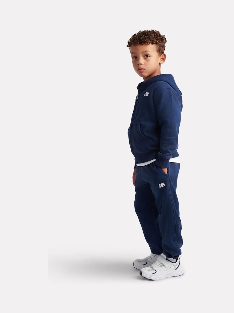 Azul - Conjunto de pantalón deportivo y pantalones de chándal con cremallera y logo pequeño de New Balance. - Imagen 2 de 8 Azul - Conjunto de pantalón deportivo y pantalones de chándal con cremallera y logo pequeño de New Balance. - Imagen 2 de 8