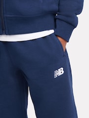 Azul - Conjunto de pantalón deportivo y pantalones de chándal con cremallera y logo pequeño de New Balance. - Imagen 5 de 8