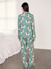 Conjunto de piyama larga de algodón con estampado de carrusel de caballos de Chelsea Peers - Imagen 4 de 7