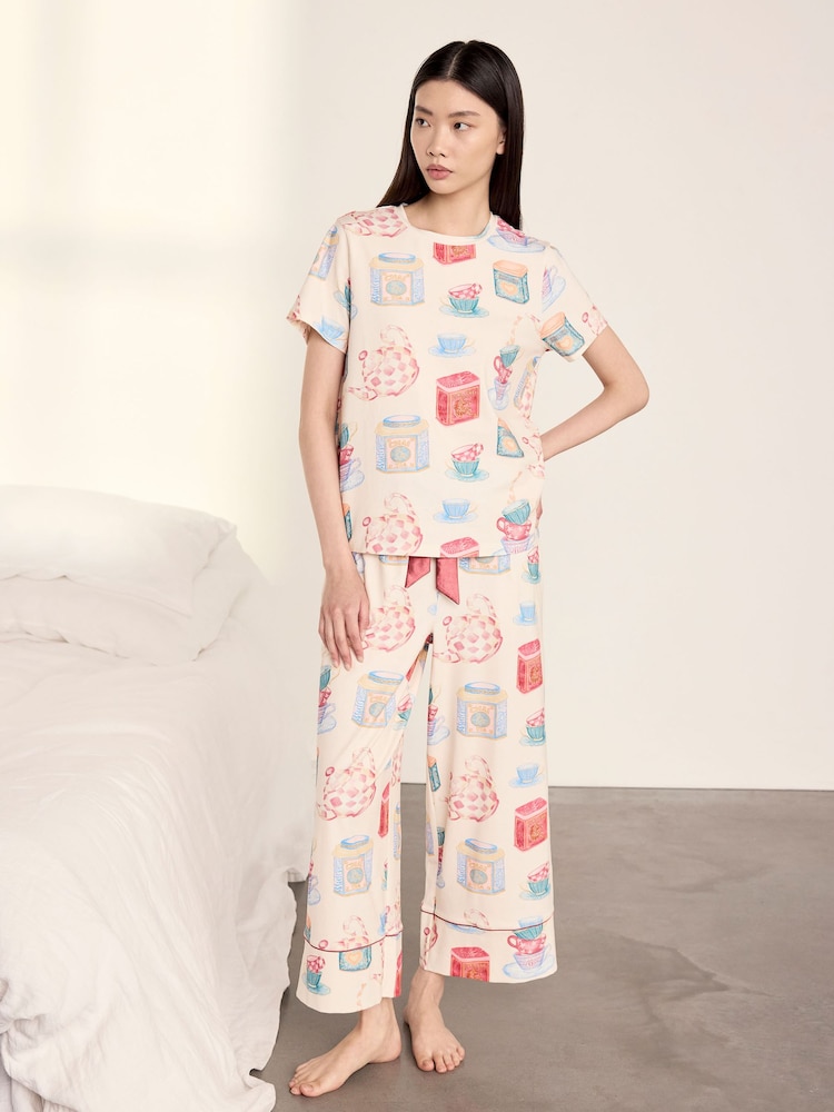 طقم بيجامة طويلة من القطن مزين بطبعة Tea Party من Chelsea Peers - صورة 1 من 5 طقم بيجامة طويلة من القطن مزين بطبعة Tea Party من Chelsea Peers - صورة 1 من 5